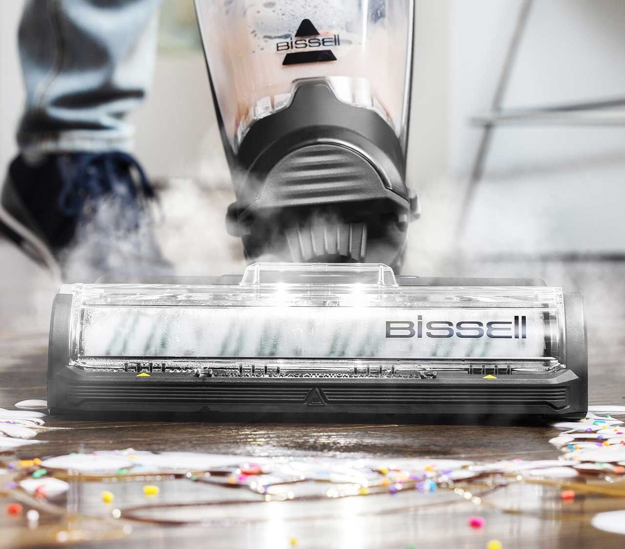 BISSELL CrossWave HydroSteam 35151 floor head working across a wet hard-floor spill