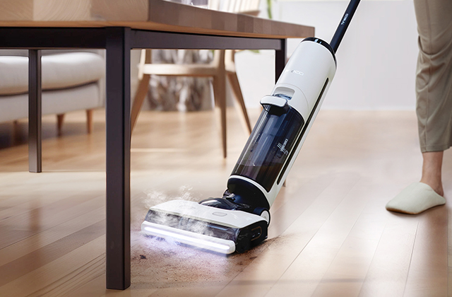 Tineco FLOOR ONE S7 Steam cordless floor washer using its powered roller on a hard floor